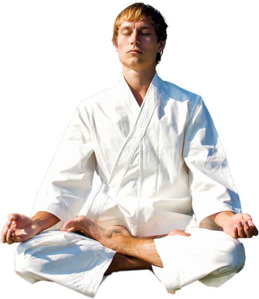 Martial Arts Lessons for Adults in Union NJ - Young Man Thinking and Meditating in White